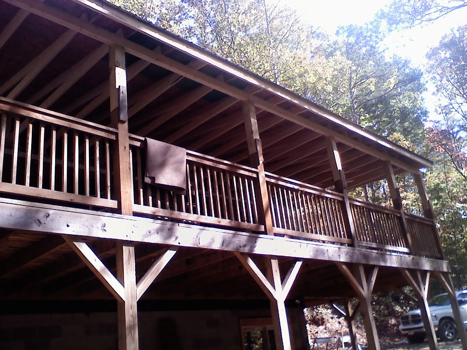 Timber framing under a new elevated porch and deck — Roof Leak Repair in Mogadore by Roofing Brothers
